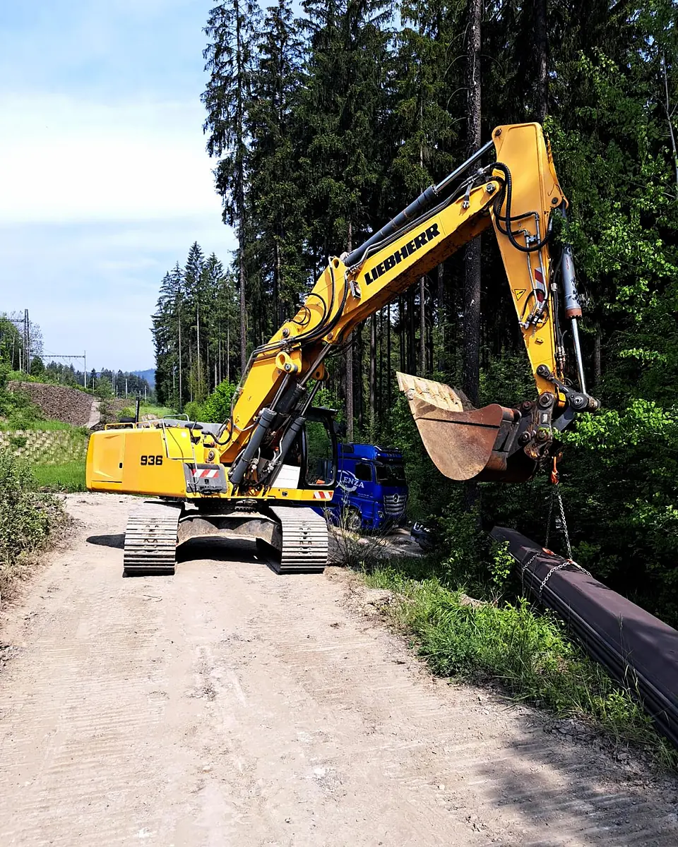 Liebherr crawler excavator on a forest access road